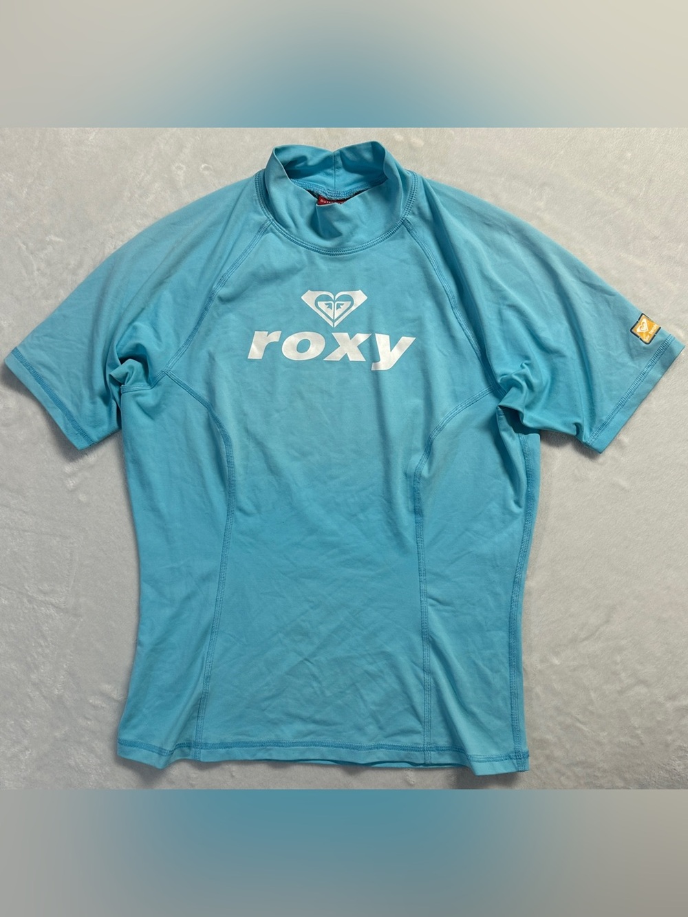 Y2K ROXY women's light blue white graphic UV tech swim top, L.